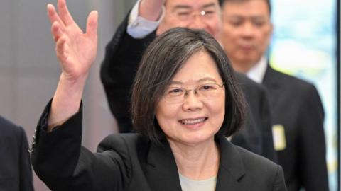 Taiwan President Tsai Ing-wen waves to the crowd at Taipei airport before leaving for Central America on 29 March 2023