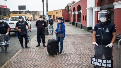 Police enforcing quarantine measures in Lima, Peru, 2 April 2020