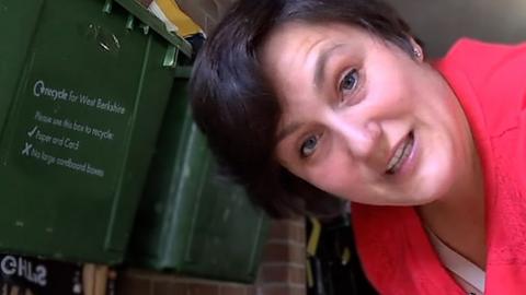Jana Little inside the garage where she recycles her community's rubbish.