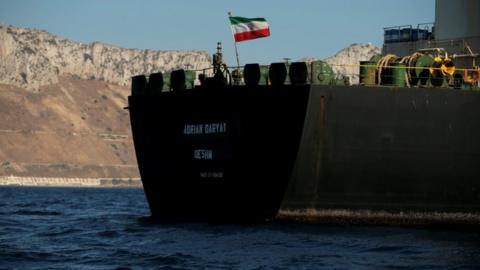 The Iranian flag flies on board the Iranian oil tanker Adrian Darya 1