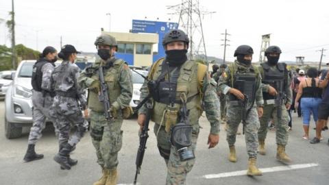 Soldiers patrol outside the high-security prison Zonal 8, in Guayaquil, Ecuador, 02 October 2021.