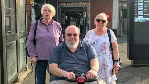 Members from Brentwood Access Group outside Brentwood Railway Station
