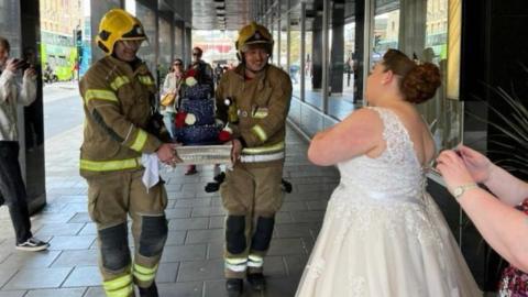 Firefighters with cake