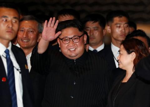 Kim Jong-un waves at the Marina Bay Sands hotel in Singapore (June 11, 2018)