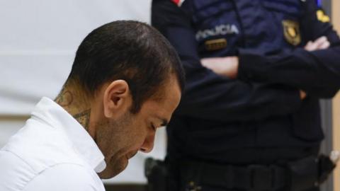 Brazilian soccer player Dani Alves sits in the dock during his trial for alleged sexual assault at Barcelona's Court in Barcelona, Spain, 05 February 2024.