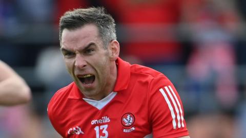 Heron celebrates scoring Derry's goal against Monaghan in the 2022 Ulster semi-final