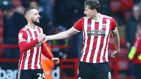 Conor Hourihane and Sander Berge