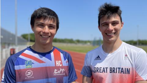 Modern pentathletes Henry and Joe Choong wearing GB kits