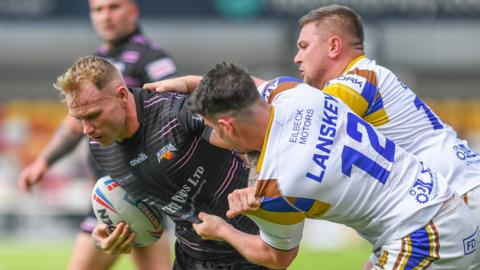 Whitehaven players make a tackle