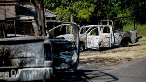 Burnt police vehicles in Michoacán state, western Mexico. Photo: 14 October 2019