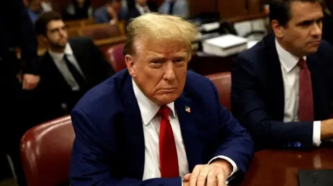 Former US President Donald Trump awaits the start of his criminal trial at New York State Supreme Court in New York, New York, USA, 06 May 2024.