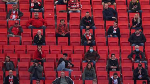 Socially distanced football fans at a match between Stuttgart and Bayer Leverkusen