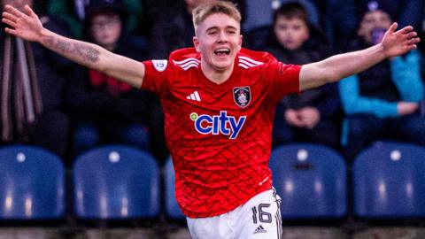 Queen's Park's Cameron Bruce celebrates