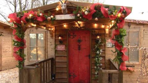 A Christmas grotto decorated with Christmas decorations