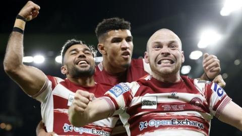 Bevan French (left) celebrates a try with Wigan team-mates Kai Pearce-Paul and Liam Marshall during the Super League Grand Final