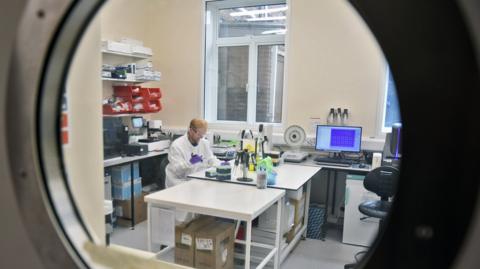 Lab technician prepares samples at one of the new labs at the Health Security Agency, Porton Down, Salisbury
