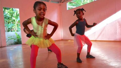 Two kids dancing