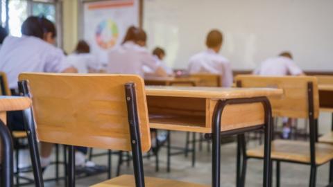 Students in classroom/exam hall (stock photo)