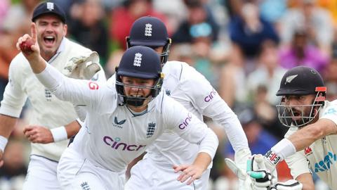 England celebrate a wicket