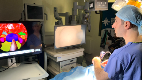 A surgeon using the AI trainer