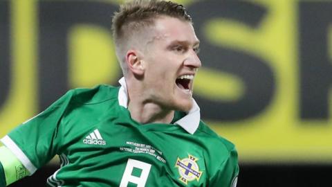 Steven Davis celebrates scoring for Northern Ireland