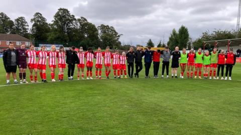 Players holding minute's silence