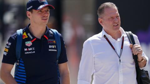 Max and Jos Verstappen walking alongside each other at the 2024 Bahrain Grand Prix