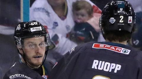 Mark Cooper (left) is congratulated by Belfast Giants team-mate Sam Ruopp after scoring one of his three goals in Sunday's 5-0 win over Guildford Flames