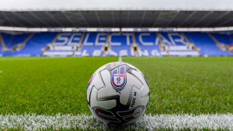 A close-up image of a football on the touchline at Reading FC