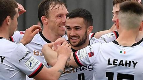 Michael Duffy of Dundalk, centre, celebrates with team-mates