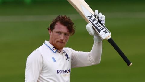 Sussex batter Tom Alsop celebrates his century on day two against Leicestershire