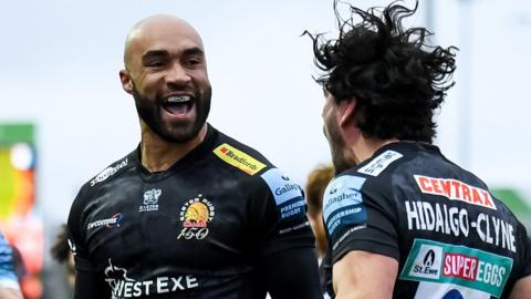 Olly Woodburn celebrates an Exeter try