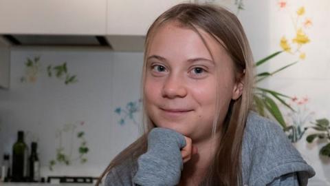 Greta Thunberg in her kitchen