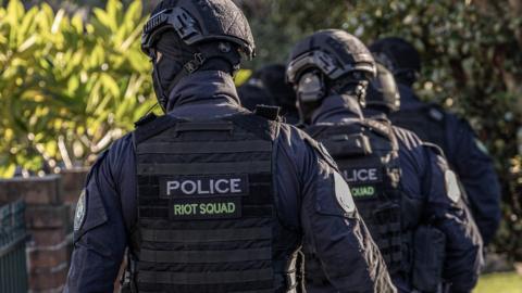 NSW Police raid a Sydney property