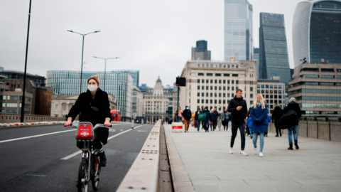 cyclist on a bridge in London