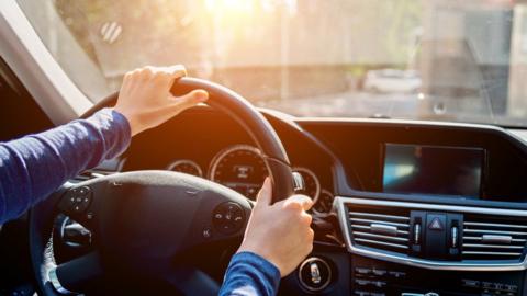 Woman driving car