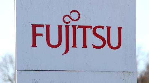 Fujitsu company logo on a sign