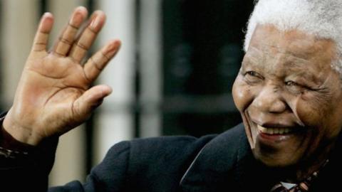 Nelson Mandela waving