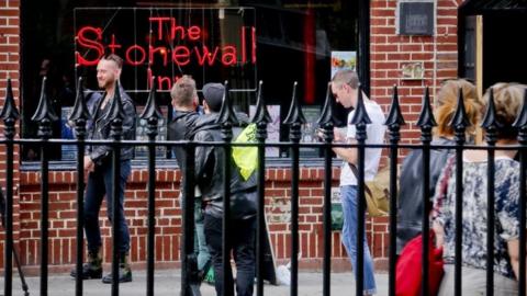 Visitors gather outside the Stonewall Inn in New York. Photo: May 2016