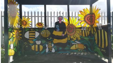 The bus stop dedicated to the late Bee Lady Jean Bishop whop died in 2021