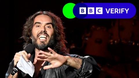 Picture of Russell Brand with Verify logo on the top