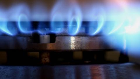Gas stove being lit