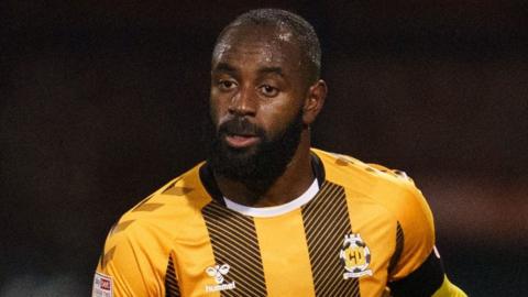 Hiram Boateng, who began his career with Crystal Palace, had two seasons with Exeter City before signing for MK Dons in 2019