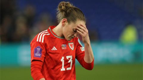 Rachel Rowe of Wales is dejected at the final whistle