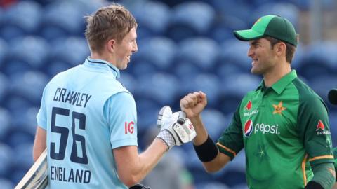 Zak Crawley and Shaheen bump fists