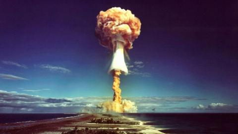 A mushroom cloud after the explosion of a French atomic bomb above the atoll of Mururoa, also known as Aopuni, in 1971