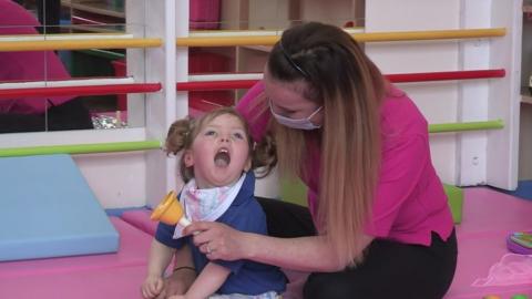 Pupil and teacher at Buddy Bear School