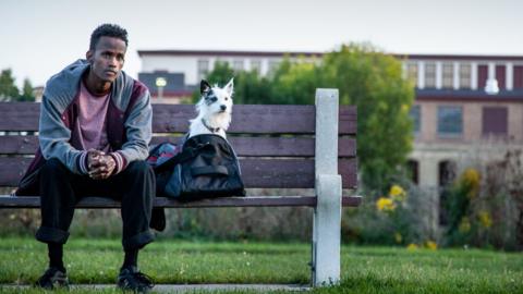 Barkhad Abdirahman plays Adan, a young Somali man living in the Cedar-Riverside neighbourhood of Minneapolis, Minnesota