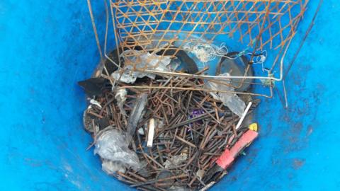 Nails in a bucket