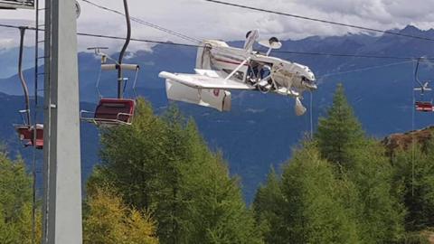 A plane left dangling in the Italian Alps